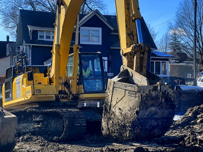 A piece of heavy equipment at work on Feb. 15, 2023 in near north Minneapolis at a complex where developers are constructing affordable housing.