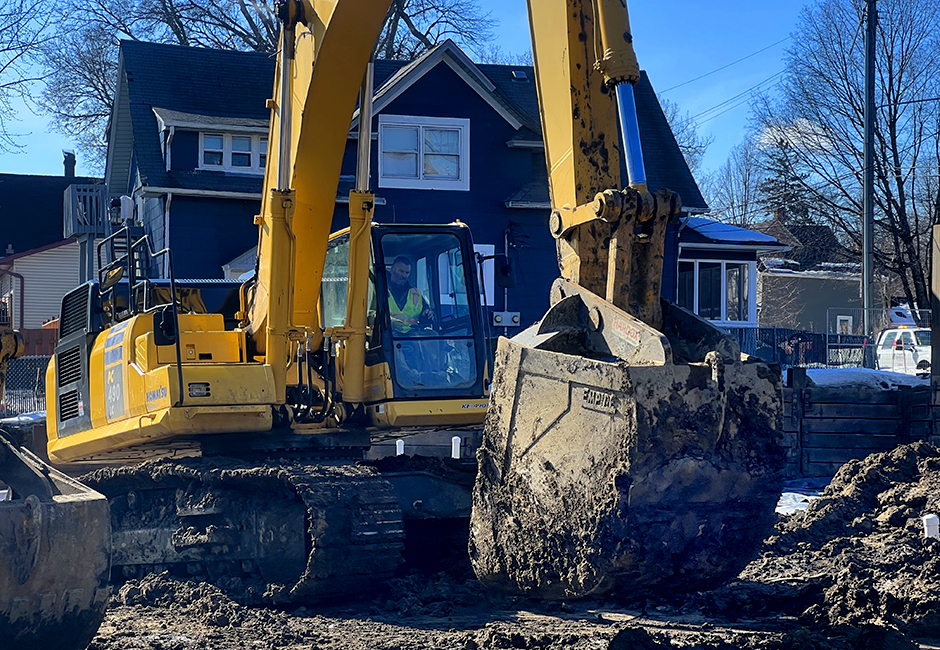 A piece of heavy equipment at work on Feb. 15, 2023 in near north Minneapolis at a complex where developers are constructing affordable housing.