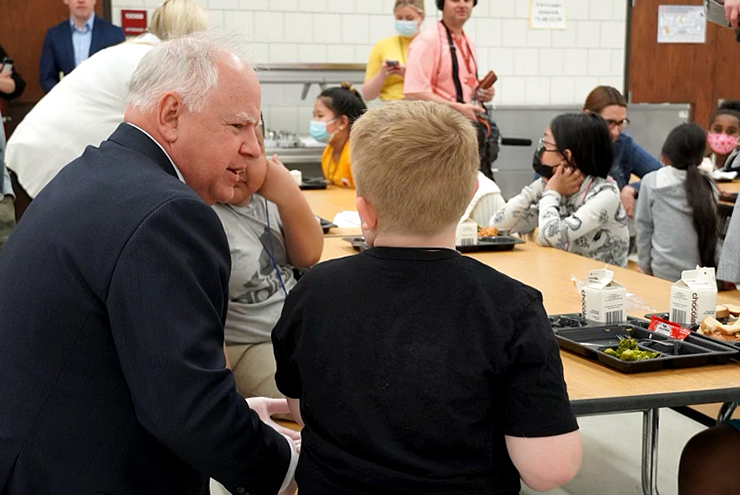 Gov. Tim Walz speaking to school children on a visit to Como Park Elementary on May 17, 2022.