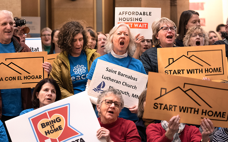 Advocates for housing attending a rally in the Capitol Rotunda on Feb. 20, 2024.