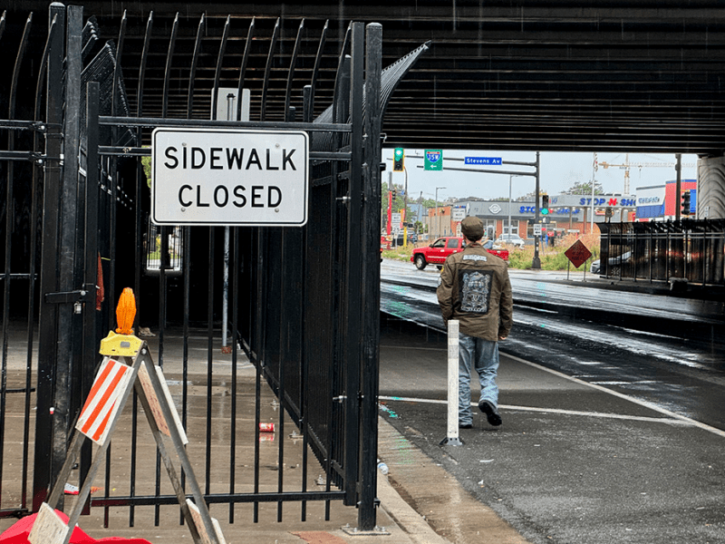 Shortly after the eviction of an encampment under the 35W bridge on 31st Street, a fence was erected around the sidewalk to prevent future camps.