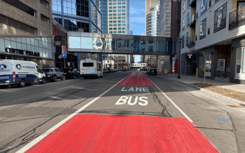 Red-striped bus lanes on 7th Street in downtown Minneapolis denoting the route of the C Line.