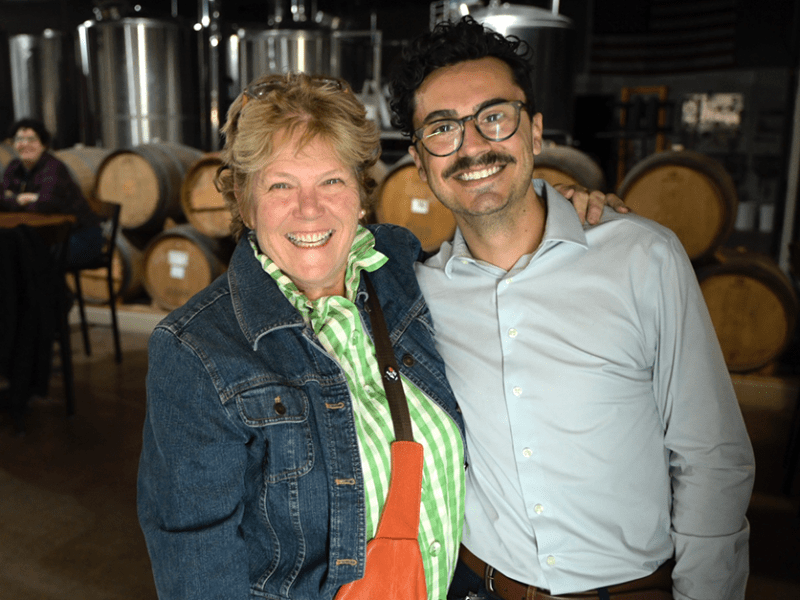 Minnesota Senate District 45 candidate Ann Johnson Stewart, left, posing with a staffer, Will Kuball, at an election night gathering at Boom Island Brewing in Minnetonka.