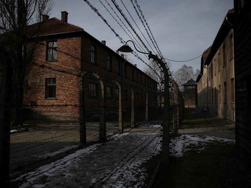 A barbed wire is seen among blocks at the site of the former Nazi German concentration and extermination camp Auschwitz prior to the 80th anniversary of the liberation of the camp in Oswiecim, Poland.