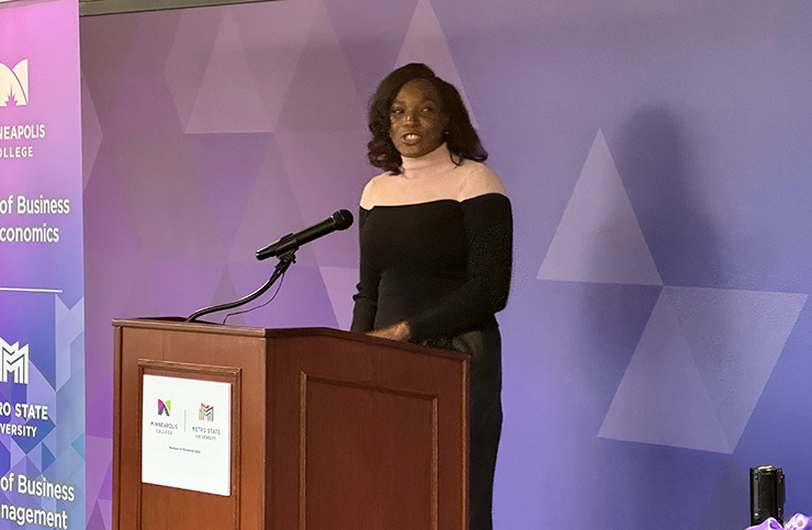 Carisha Thomas speaking on Nov. 22 at the ribbon cutting ceremony for the Management Education Center.