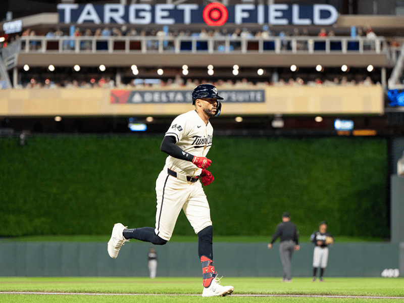 Minnesota Twins shortstop Carlos Correa hitting a home run against the Miami Marlins in the sixth inning at Target Field on Sept. 26.