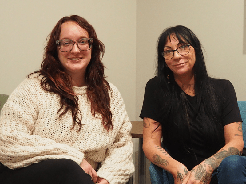 Lauren Daniel, clinical director, and Jacki Yellowflower, peer specialist supervisor, in the Emma Norton Living Room.