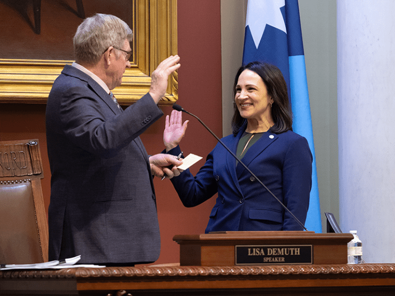 State Rep. Paul Anderson swearing in state Rep. Lisa Demuth as Speaker of the House.