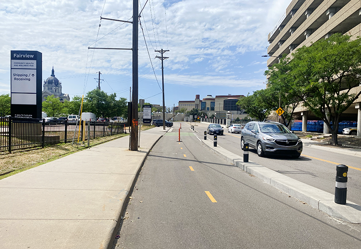 The bollards along downtown St.Paul’s Capital City Bikeway aren't enough to keep vehicle traffic off the protected two-way path.