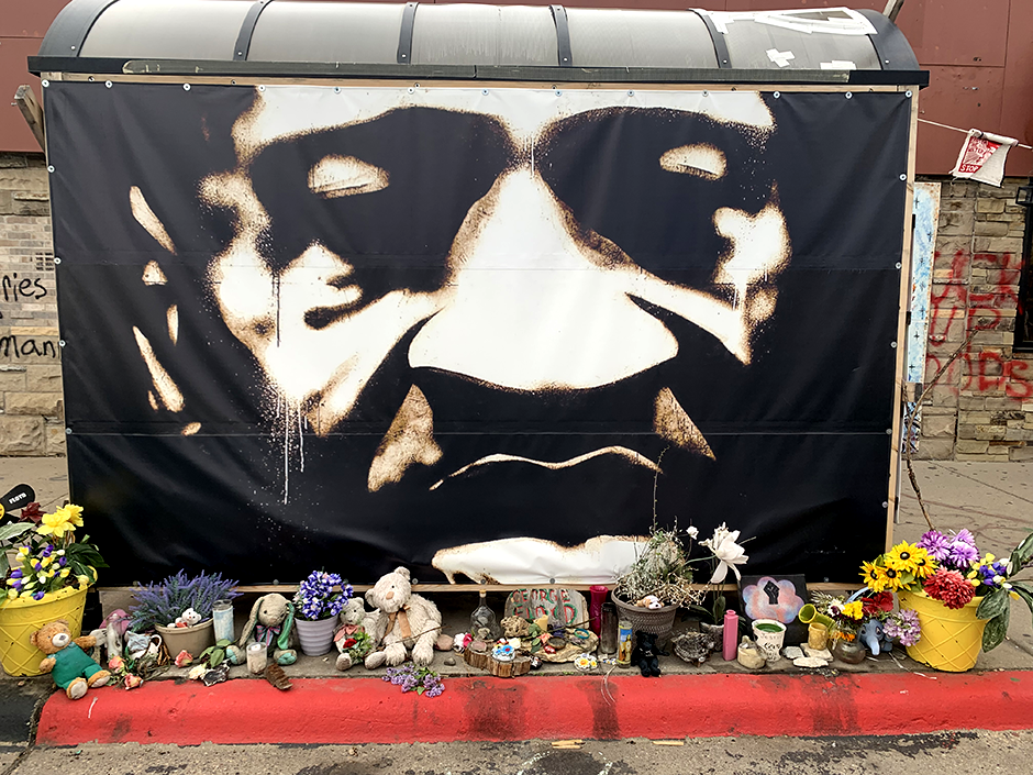 The George Floyd memorial at the bus stop in front of Cup Foods.