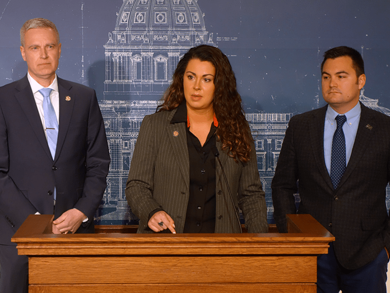 State Sen. Julia Coleman, flanked by Sens. Michael Kreun and Zach Duckworth, speaking at Thursday’s press conference at the Minnesota State Capitol.