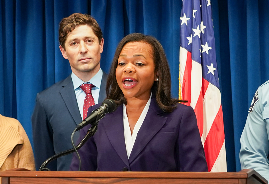 Assistant Attorney General Kristen Clarke spoke at a press conference on Monday in Minneapolis to announce the agreement. Behind her is Minneapolis Mayor Jacob Frey.