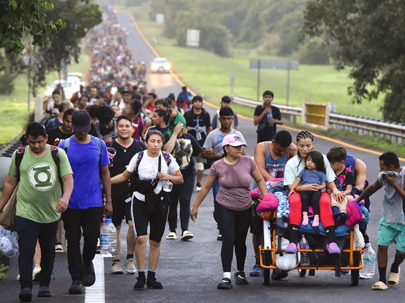 Migrants walk along the Huixtla highway in the state of Chiapas, Mexico, Oct. 22, 2024, hoping to reach the country's northern border and ultimately the United States.