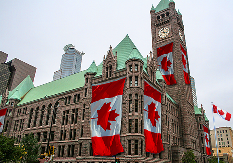 Minneapolis City Hall decorated with Canadian flags
