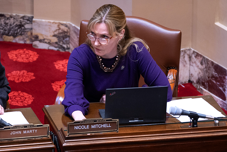 State Sen. Nicole Mitchell voted to uphold a ruling by DFL Senate President Bobby Joe Champion that the expulsion motion was out of order, a ruling that was upheld on a tie vote of 33-33.