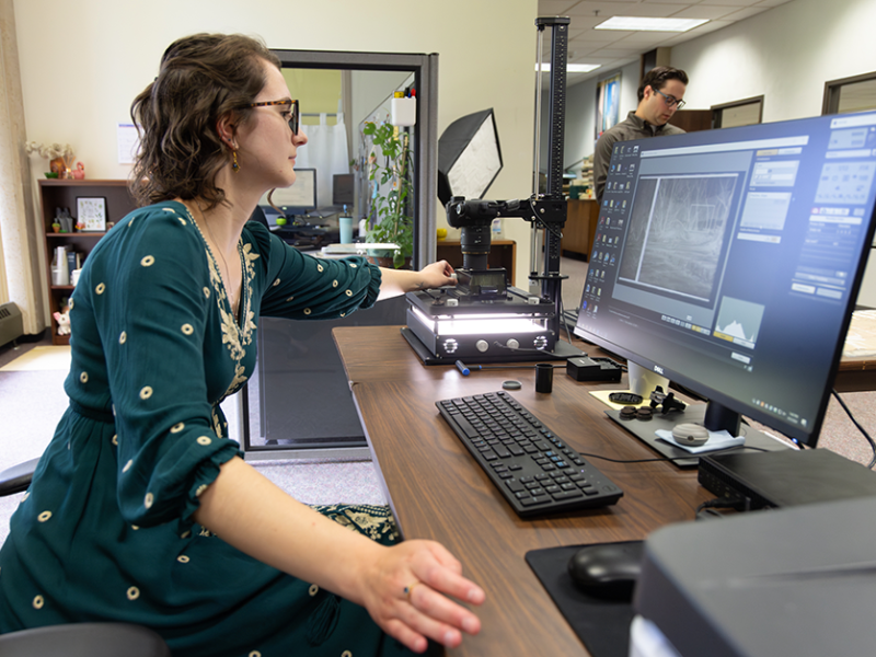 Nikki Pegarsch, digitization assistant at the University of Wisconsin-La Crosse’s Murphy Library, digitizes materials related to the Mississippi River and the Driftless Region.