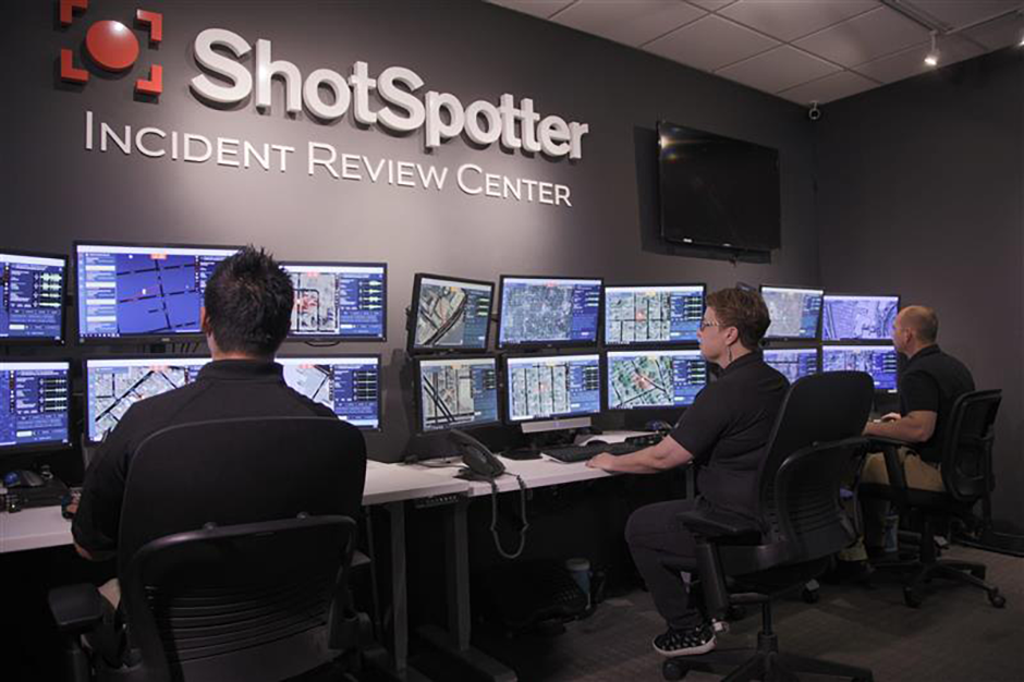 Workers review ShotSpotter alerts at an Incident Review Center in California.