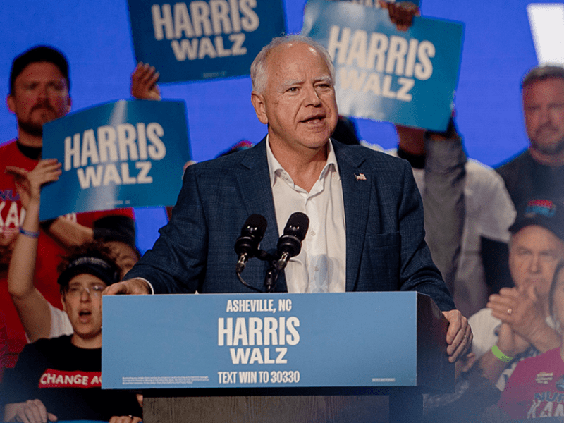 Gov. Tim Walz speaking at a rally at Salvage Station in Asheville, North Carolina, on Sept. 17.