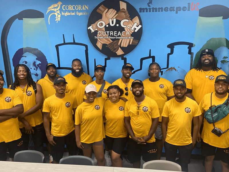 T.O.U.C.H. Outreach team members at their South Minneapolis office right next to the Lake Street light rail station.