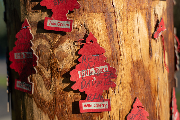 Supporters leave messages on a telephone pole near Daute Wright’s memorial.